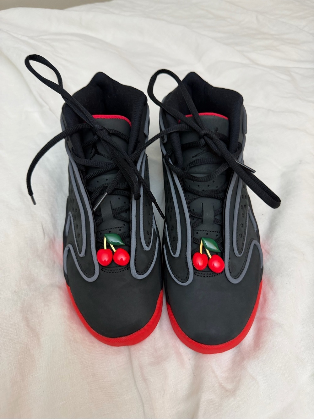Melody Ehsani x Nike Black and Red Air Jordans with Cherry Accent